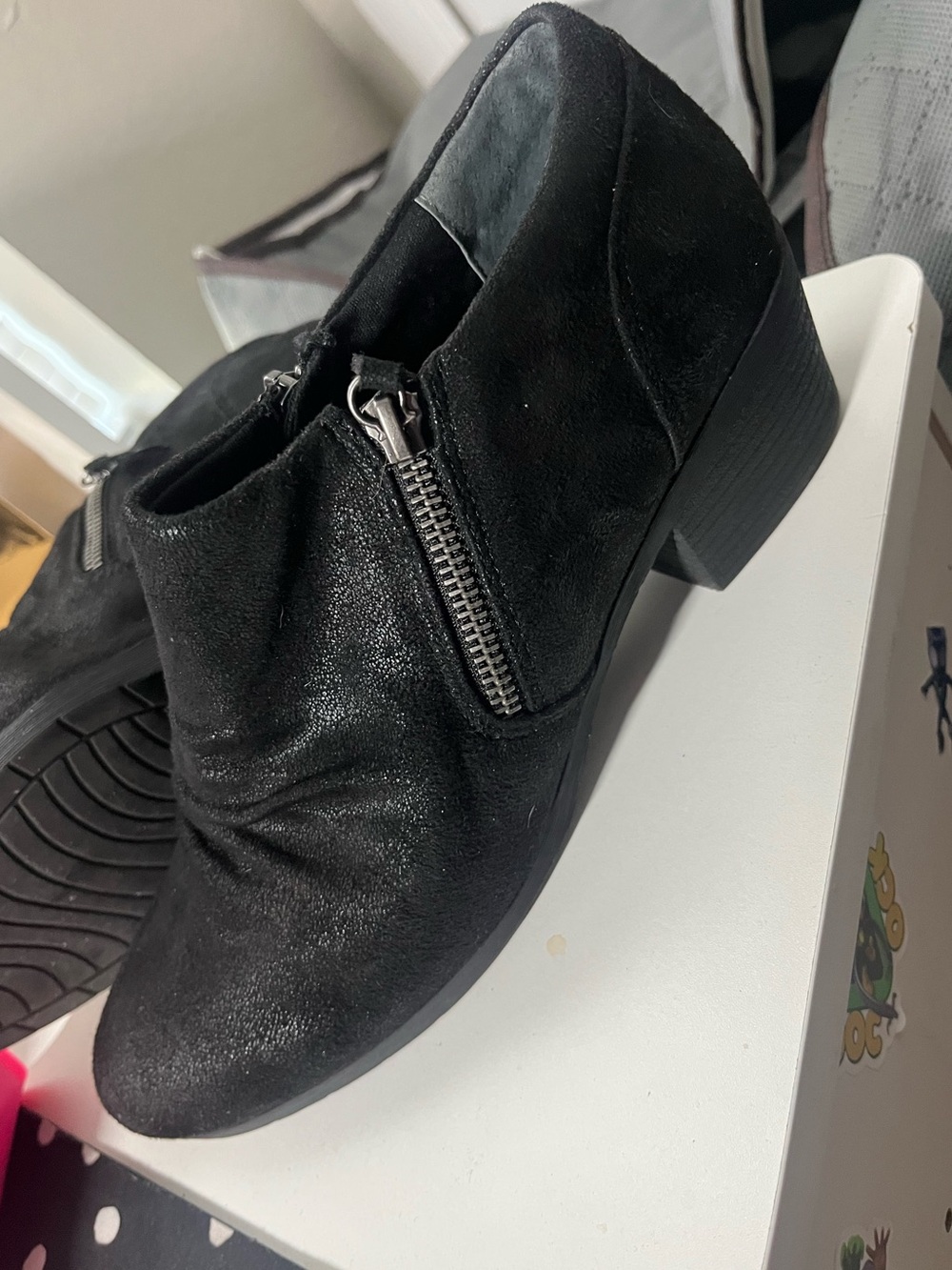 Bjorndal women’s heeled ankle boots in black with side zippers size 9.5
